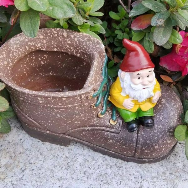 Nain de jardin avec botte colorée