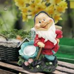 Nain de jardin avec projecteur décoratif