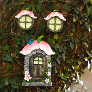 Gnome de jardin avec une maison colorée