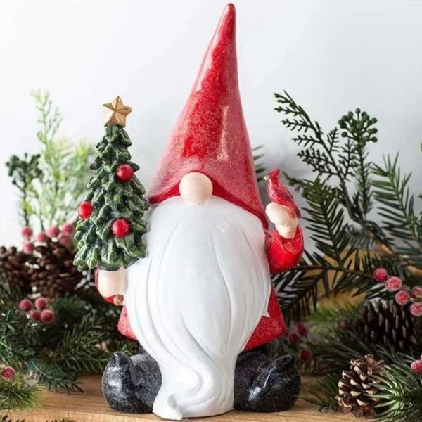 Figurine de jardin humoristique : père Noël faisant un doigt d'honneur