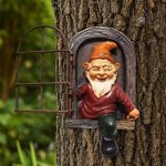 Nain de jardin Simplet avec chapeau pointu et sourire amical