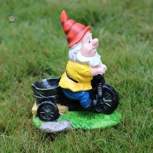 Nain de jardin sur vélo décoratif